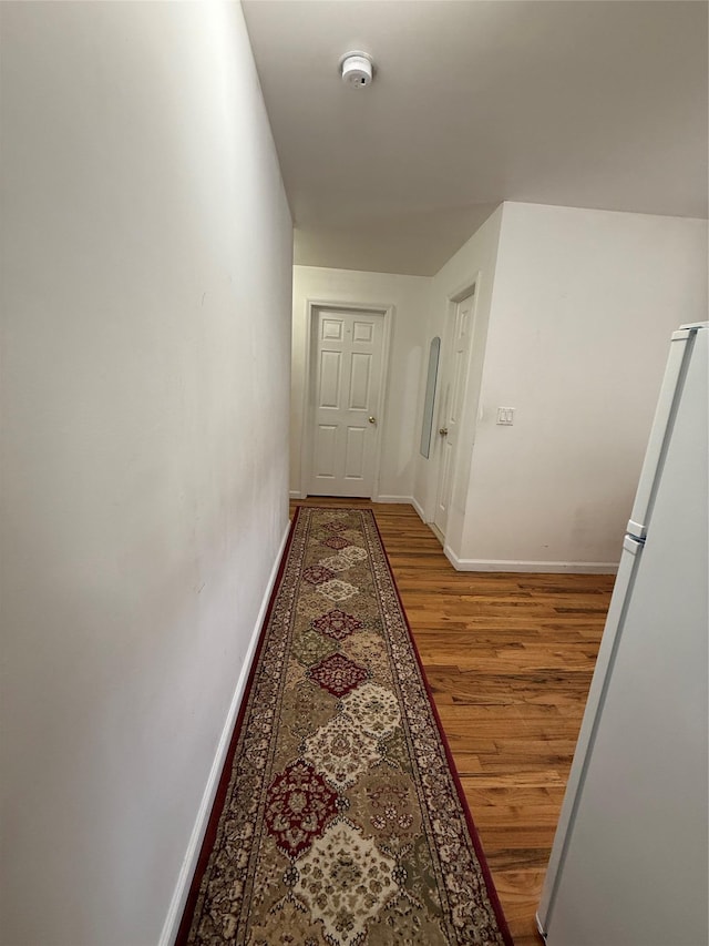 10808 86th St, Ozone Park, NY 11417 - hallway with wood finished floors and baseboards