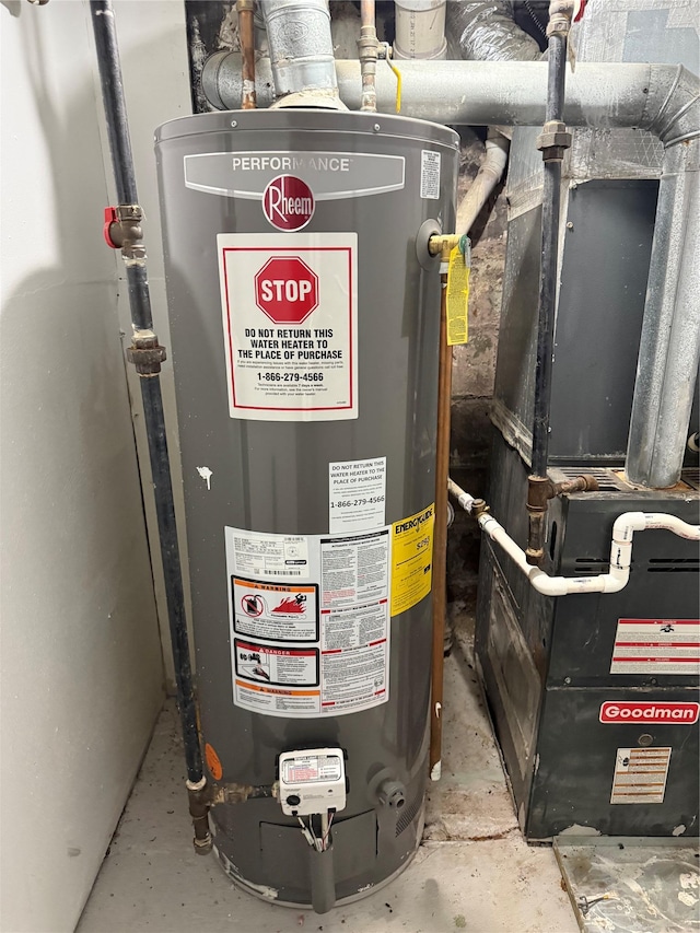 10808 86th St, Ozone Park, NY 11417 - utility room featuring gas water heater and heating unit