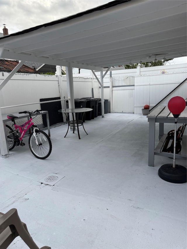 10808 86th St, Ozone Park, NY 11417 - view of patio / terrace with a hot tub