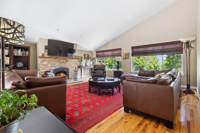 96 Cherry Hill Ct, Briarcliff Manor, NY 10510 - living room featuring wood finished floors, high vaulted ceiling, a fireplace, and baseboards