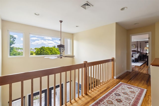 96 Cherry Hill Ct, Briarcliff Manor, NY 10510 - hall with plenty of natural light, wood finished floors, baseboards, and recessed lighting