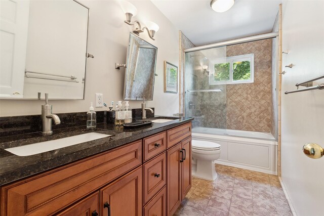 96 Cherry Hill Ct, Briarcliff Manor, NY 10510 - full bathroom featuring double vanity, toilet, and combined bath / shower with glass door
