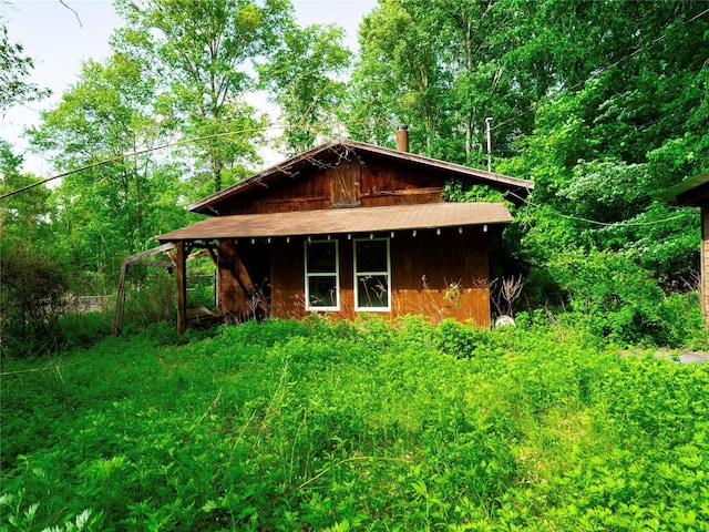 68 Union School Rd, Montgomery, NY 12549 - view of side of property featuring a chimney