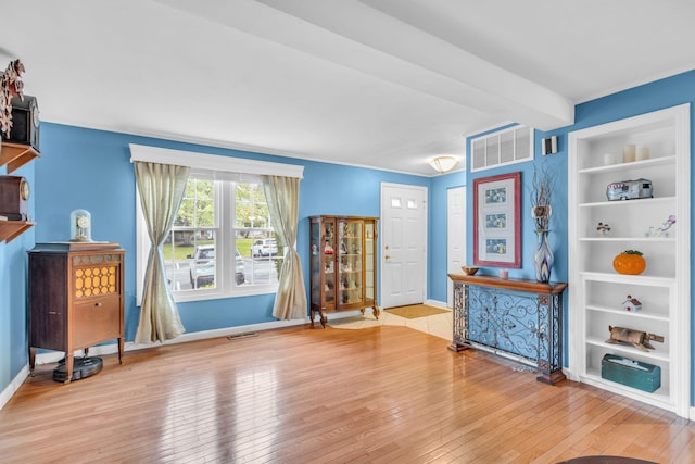 2103 Kings Way Unit 2103, Carmel, NY 10512 - living area with hardwood / wood-style floors, baseboards, and built in shelves