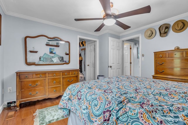 2103 Kings Way Unit 2103, Carmel, NY 10512 - bedroom featuring wood finished floors, crown molding, and a ceiling fan