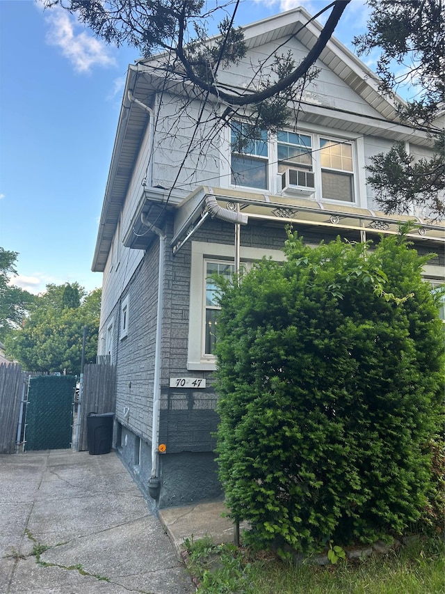 7047 Nansen St, Forest Hills, NY 11375 - view of side of home with cooling unit