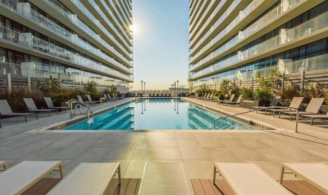 13101 40th Rd Unit 10C, Flushing, NY 11354 - community pool featuring a patio