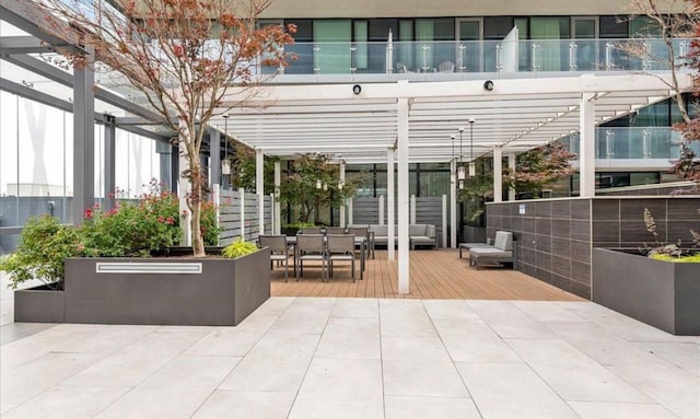 13101 40th Rd Unit 10C, Flushing, NY 11354 - view of patio / terrace featuring a pergola, outdoor dining space, a deck, and an outdoor hangout area