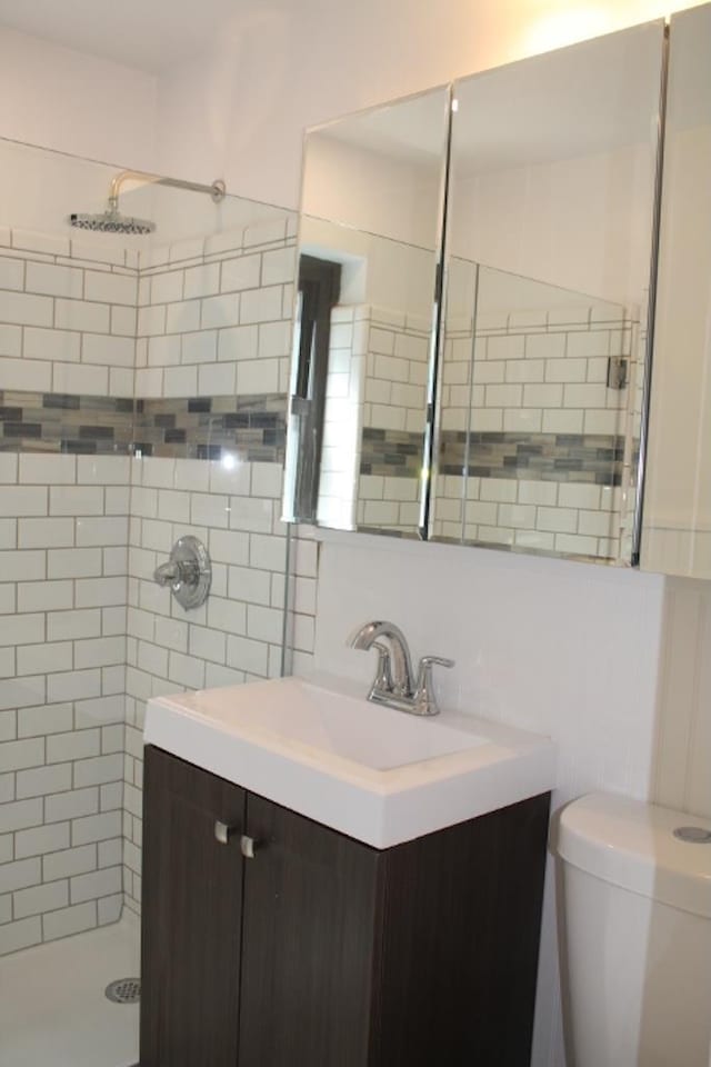 51 White Oak Unit 1H, New Rochelle, NY 10801 - full bath with a shower stall, vanity, toilet, and tile walls