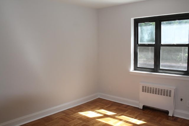 51 White Oak Unit 1H, New Rochelle, NY 10801 - empty room featuring radiator heating unit and baseboards