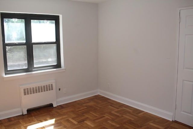 51 White Oak Unit 1H, New Rochelle, NY 10801 - empty room with radiator and baseboards