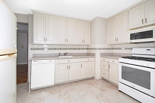 609 Kappock St Unit 3F, Bronx, NY 10463 - kitchen featuring white appliances, a sink, light countertops, and cream cabinets
