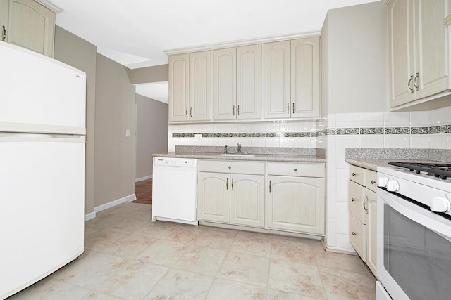 609 Kappock St Unit 3F, Bronx, NY 10463 - kitchen with white appliances, light countertops, backsplash, cream cabinets, and a sink