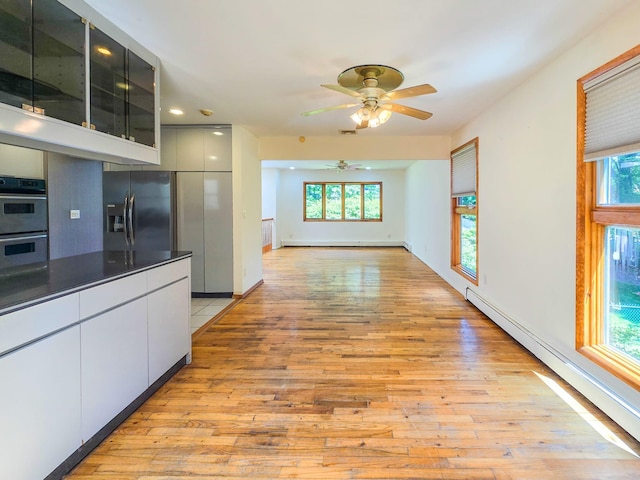 241 Summit Park Rd, Spring Valley, NY 10977 - unfurnished living room with a baseboard radiator, a ceiling fan, light wood finished floors, recessed lighting, and baseboards