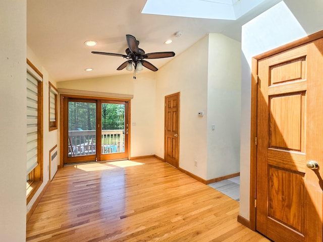 241 Summit Park Rd, Spring Valley, NY 10977 - unfurnished room with a skylight, lofted ceiling, light wood-type flooring, recessed lighting, and a ceiling fan
