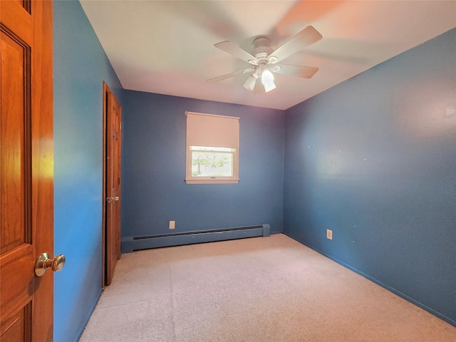 241 Summit Park Rd, Spring Valley, NY 10977 - unfurnished room with baseboard heating, light carpet, ceiling fan, and baseboards