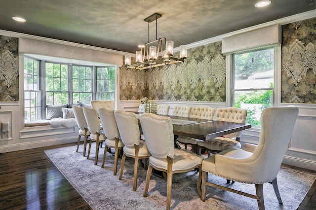 70A Davis Rd, Port Washington, NY 11050 - dining space with crown molding, a chandelier, healthy amount of natural light, dark wood-type flooring, and wainscoting