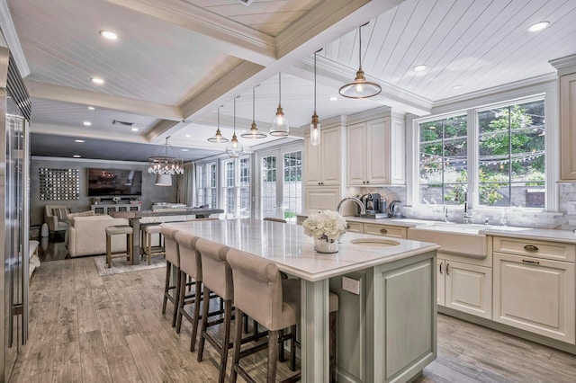 70A Davis Rd, Port Washington, NY 11050 - kitchen featuring healthy amount of natural light, coffered ceiling, light wood finished floors, open floor plan, and recessed lighting