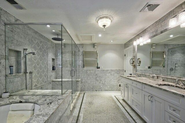 70A Davis Rd, Port Washington, NY 11050 - full bathroom with a marble finish shower, double vanity, a garden tub, and recessed lighting