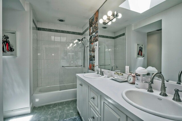 70A Davis Rd, Port Washington, NY 11050 - full bath featuring double vanity, bathtub / shower combination, and a skylight