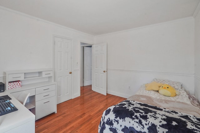 29 Patchogue Rd, Sound Beach, NY 11789 - bedroom with ornamental molding, light wood-style flooring, and an office area