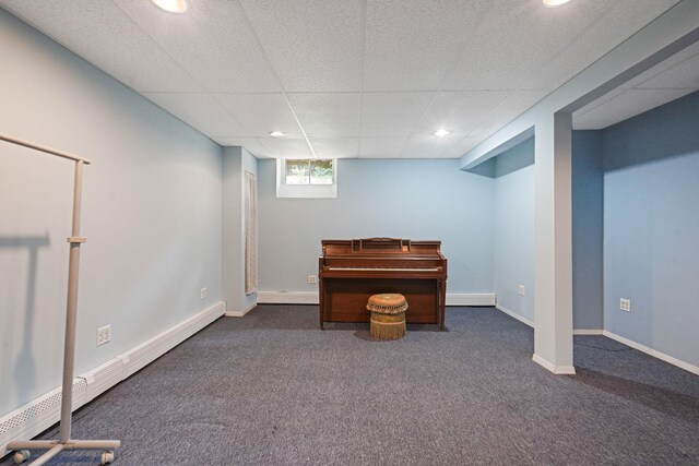 29 Patchogue Rd, Sound Beach, NY 11789 - basement featuring carpet floors, recessed lighting, a baseboard radiator, and a drop ceiling
