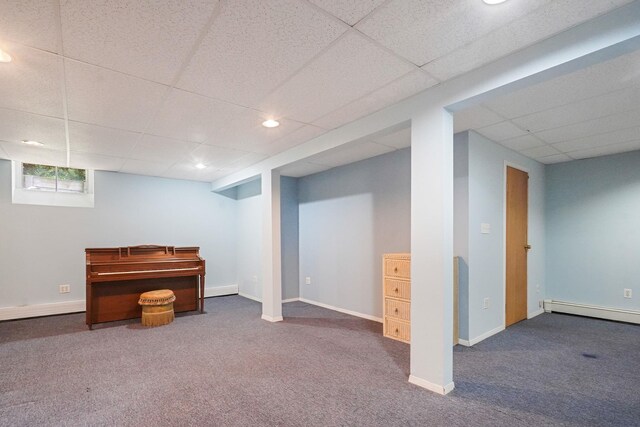 29 Patchogue Rd, Sound Beach, NY 11789 - finished basement with carpet flooring, a drop ceiling, baseboard heating, and recessed lighting
