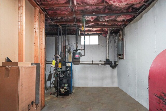 29 Patchogue Rd, Sound Beach, NY 11789 - basement featuring a heating unit and oil tank