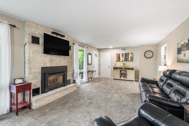 1024 Plains Rd, Wallkill, NY 12589 - carpeted living area with a fireplace and baseboards