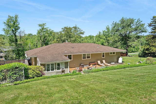 1024 Plains Rd, Wallkill, NY 12589 - rear view of house featuring a lawn, a patio, and a shingled roof