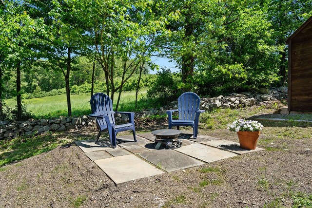 1024 Plains Rd, Wallkill, NY 12589 - view of patio / terrace featuring a fire pit