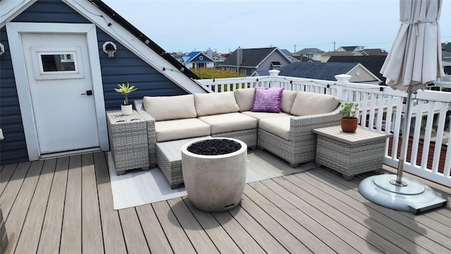 41 Michigan St, Long Beach, NY 11561 - wooden terrace with outdoor lounge area and a residential view