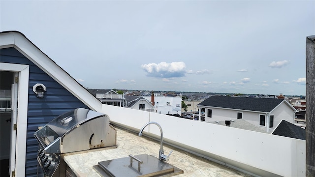 41 Michigan St, Long Beach, NY 11561 - view of patio featuring a sink, area for grilling, and a residential view