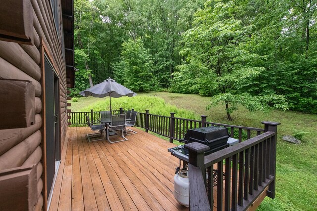 1206 Hollow Rd, Clinton Corners, NY 12514 - wooden terrace featuring outdoor dining space and a view of trees