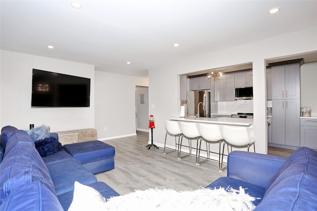 221 Richard Ct, Pomona, NY 10970 - living room featuring light wood-style flooring, recessed lighting, and baseboards