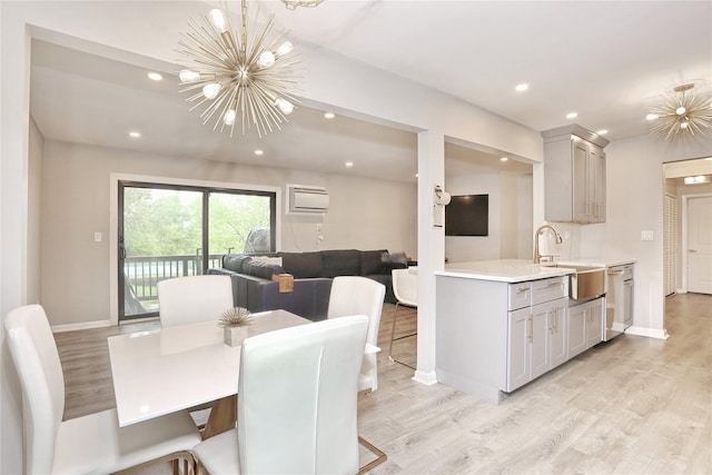 221 Richard Ct, Pomona, NY 10970 - dining space featuring a chandelier, baseboards, light wood-style flooring, and recessed lighting