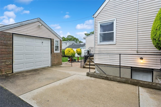 1343 E St, Elmont, NY 11003 - detached garage with concrete driveway