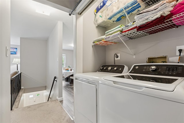 241 Fairview Cir, Middle Island, NY 11953 - laundry room with washer and dryer and wood finished floors