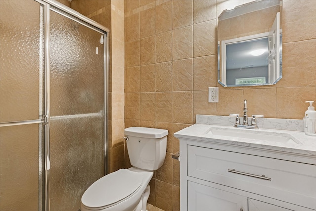 241 Fairview Cir, Middle Island, NY 11953 - bathroom featuring tile walls, vanity, toilet, and a stall shower