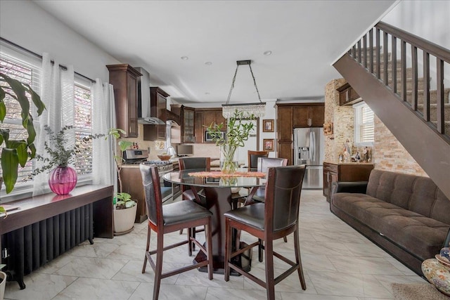 23 Bonta St, Elmont, NY 11003 - dining area with light marble finish floors and stairs