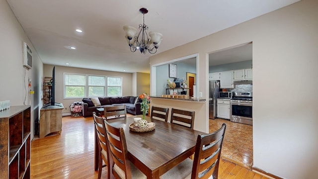 285 Riley Rd, New Windsor, NY 12553 - dining room with light wood-type flooring, recessed lighting, a chandelier, and a baseboard radiator