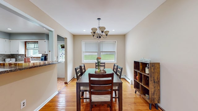 285 Riley Rd, New Windsor, NY 12553 - dining room with a chandelier, healthy amount of natural light, baseboard heating, light wood-type flooring, and recessed lighting