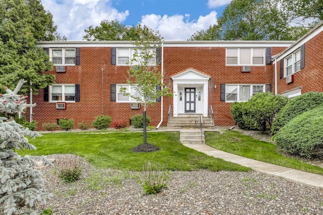 9 Danbury Ct Unit 1601, Suffern, NY 10901 - view of front of house featuring brick siding and a front yard