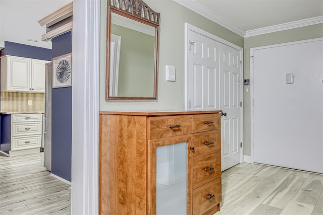 9 Danbury Ct Unit 1601, Suffern, NY 10901 - entryway featuring light wood finished floors, ornamental molding, and baseboards