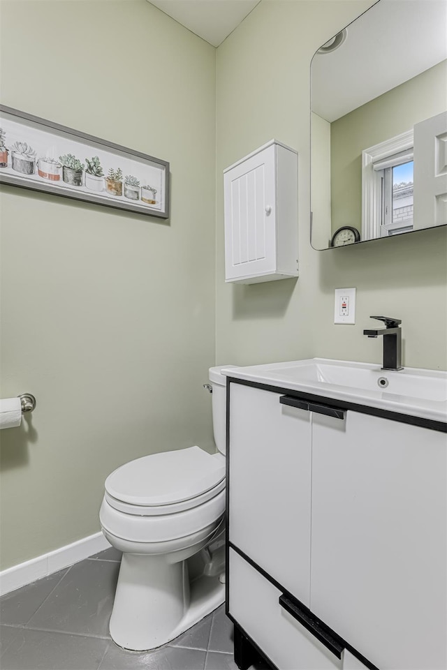 9 Danbury Ct Unit 1601, Suffern, NY 10901 - bathroom with vanity, tile patterned flooring, toilet, and baseboards
