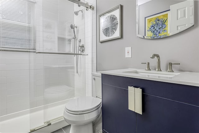 9 Danbury Ct Unit 1601, Suffern, NY 10901 - bathroom featuring toilet, a tile shower, and vanity