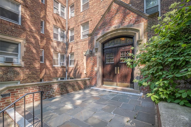 19 William St Unit 3G, Mount Vernon, NY 10552 - view of exterior entry featuring brick siding and cooling unit