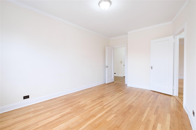 19 William St Unit 3G, Mount Vernon, NY 10552 - unfurnished bedroom with light wood-type flooring and crown molding