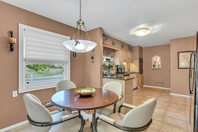 28 Bradford Rd, Plainview, NY 11803 - dining space featuring baseboards and light floors