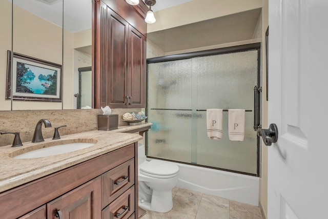 28 Bradford Rd, Plainview, NY 11803 - bathroom featuring vanity, enclosed tub / shower combo, and toilet